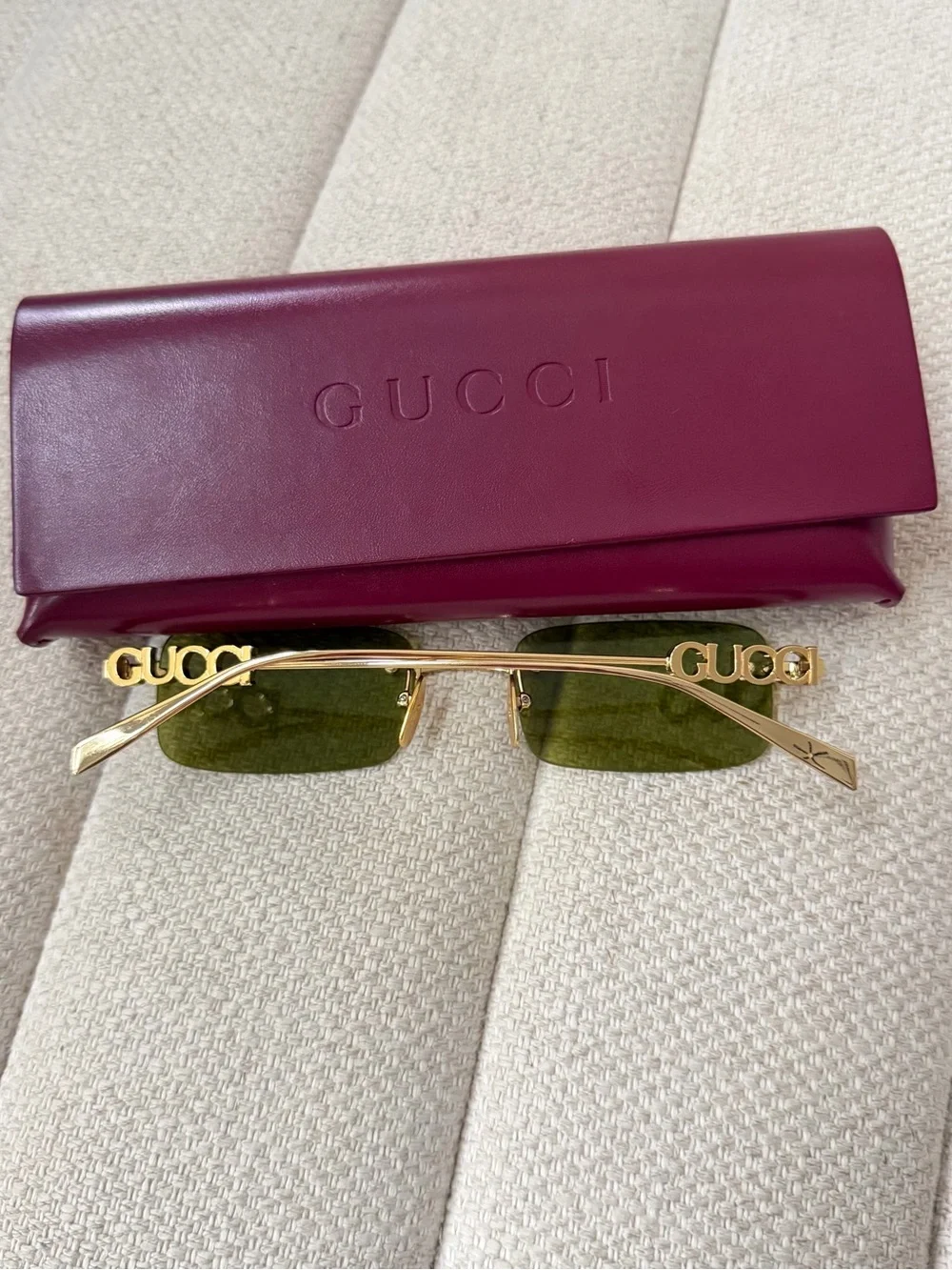 Gucci women’s Rimless Logo Sunglasses in Green